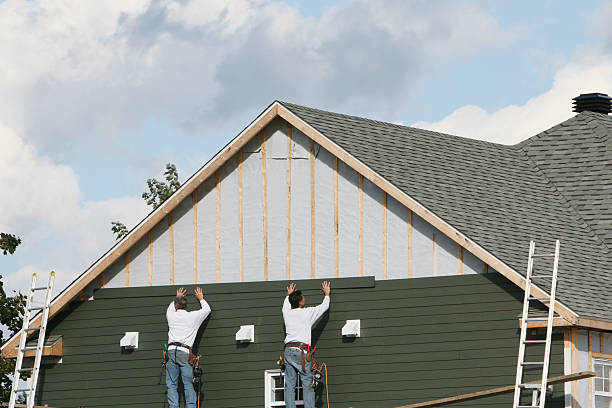 Professional Emergency Siding Repair technician working in Strasburg, CO